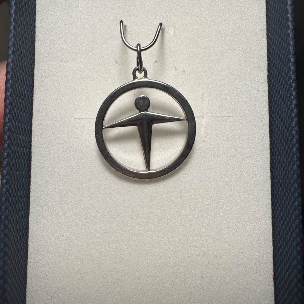 Tiffany & Co. .925 Sterling Silver Manpower Pendant 2.32g